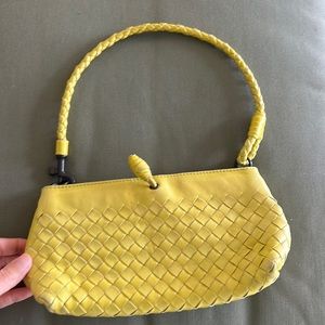 Bottega Veneta mini yellow shoulder bag.
